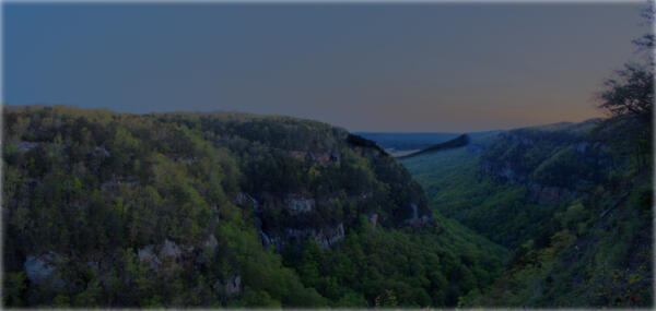 A panoramic view of sunrise over Cloudland Canyon
