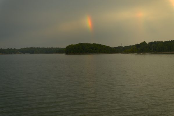 Double rainbow over Lake Lanier as storm clouds approach