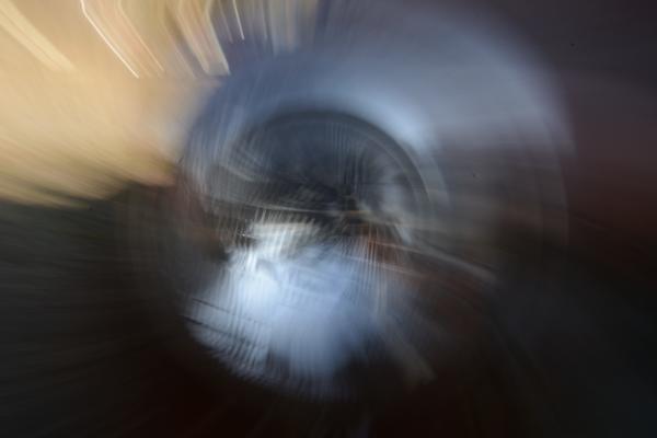 Zoom/twist blur of a headlight.